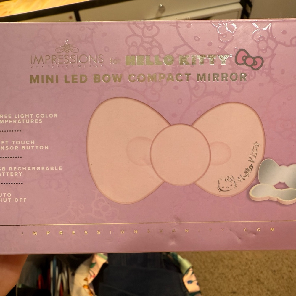Brand new impressions vanity hello kitty LeD bow compact mirror